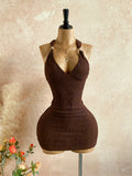 brown halter bodycon mini dress with deep v neckline
