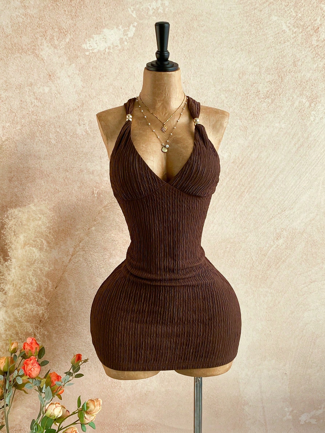 brown halter bodycon mini dress with deep v neckline