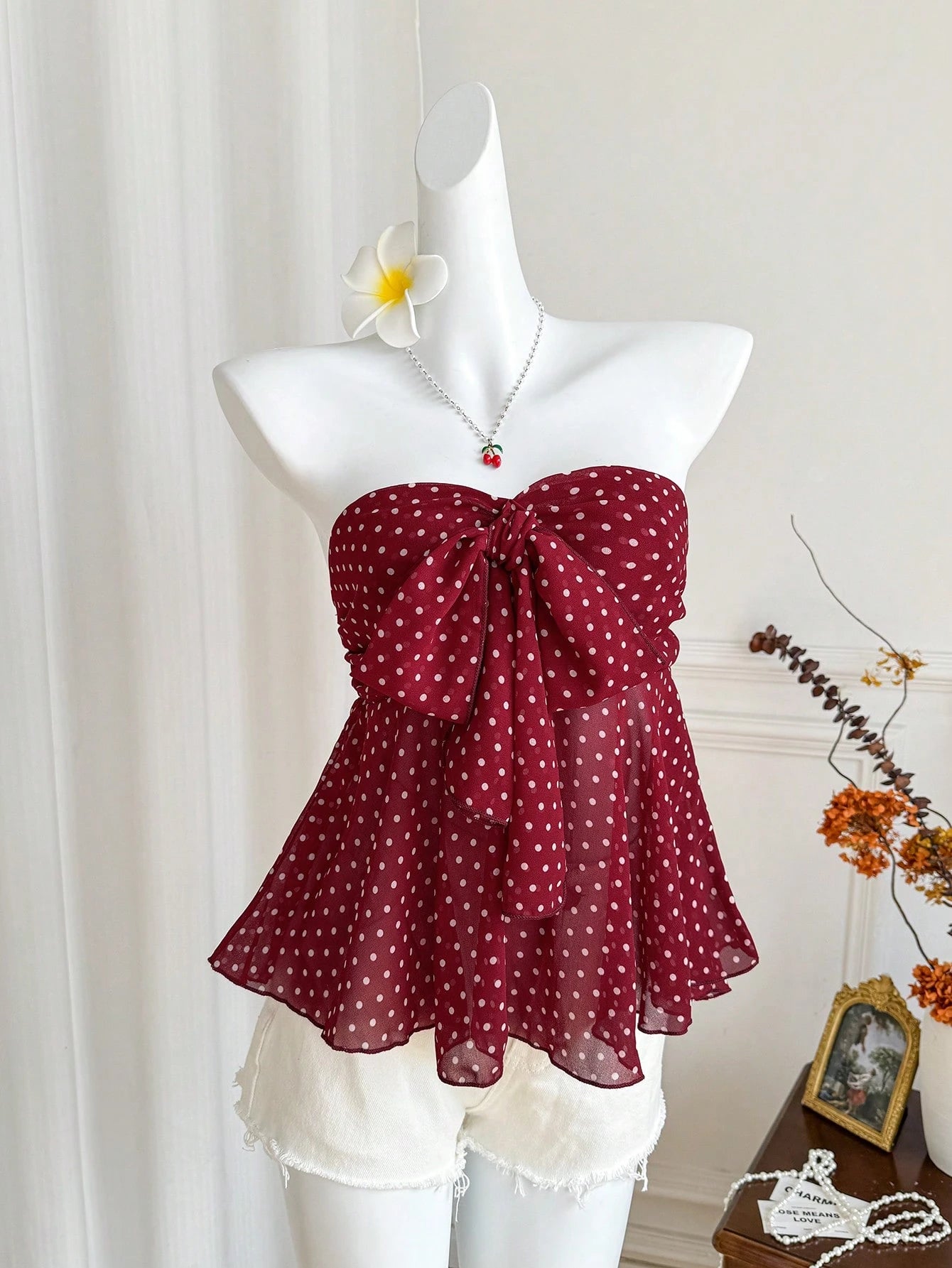strapless polka dot bow front chiffon top